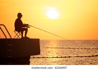 fisherman with dusk
