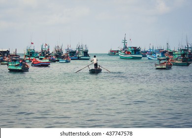 fisherman and fisher boats on ocean