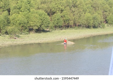 Fisherman Fishing In The Naf River, Teknaf, Bangladesh