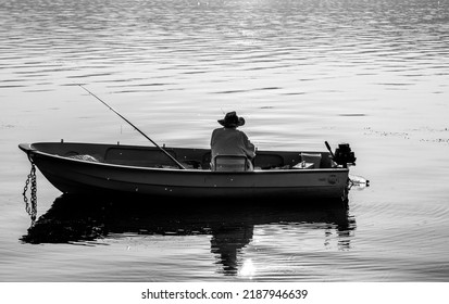 Fisherman, On The Boat. Water Reflection. 8. 5. 2022 Star Dojran Macedonia