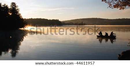 Fisherman on Lake at First Light