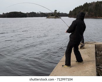 the fisherman is pulling the fish