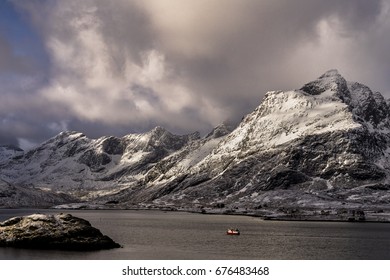 Fisherman Ride The Boat To Arctic Ocean For Catch Some Fish For Sale At Lofoten Island Norway