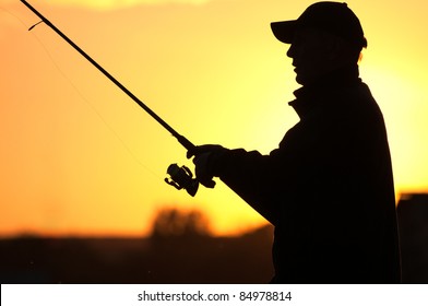 Fisherman Silhouette At Sunset