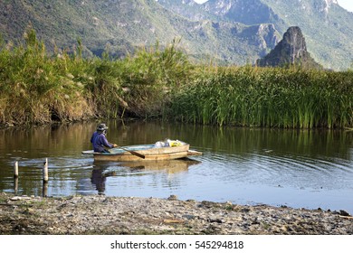 Fisherman  In Thailand, He Used Drift Net On The Boat For Fishin