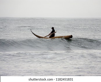 fisherman and traditional raft 