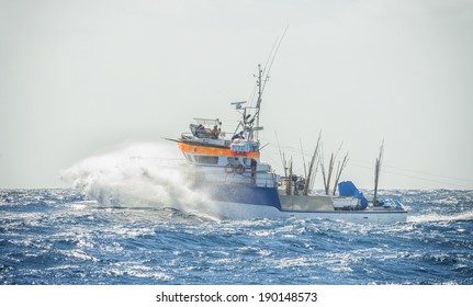 Fisherman's Boat In The Storm