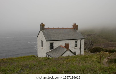 Fisherman's Cottage on a Cliff Top at Cape Cornwall by the Atlantic Ocean on the South West Coast Path between Pendeen Watch and Sennen Cove - Powered by Shutterstock