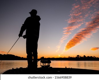 Fishermen Angler Sunset On Bass Boat