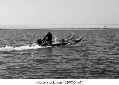 Fishermen showing different fishing techniques at Torre del Lago, Italy