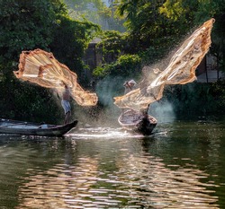 Fishermen Throw A Fishing Nets. Morning View. Hue City, Northern Vietnam