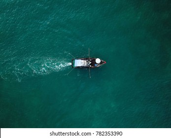 Стоковая фотография: fishermen workplace, fisher boat shot with a drone, down facing shot, drone only, fishing in the Pacific Ocean, sea fishing 