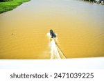 Fishers Boat Across The Big Mahakam River, East Kalimantan, Indonesia