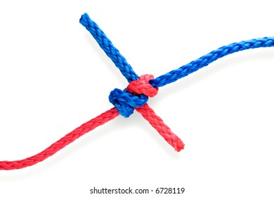 Fisher's dagger knot with red and blue ropes. Isolated on white. Tight.