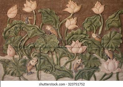 fishes and lotus pattern on stone wall  - Powered by Shutterstock