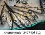 Fishes for sale on on Mercat de Sant Josep de la Boqueria food market in Barcelona, Spain