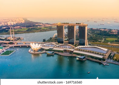 Fish-eye view of Singapore city skyline at sunset. 