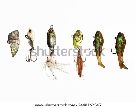 Colorful​ Fishing bait, deep black plug with​ 3-way hook​ of​ Fishing bait​ isolated​ on​ white​ background.sea ​​fish, striped bass,Prey fish.