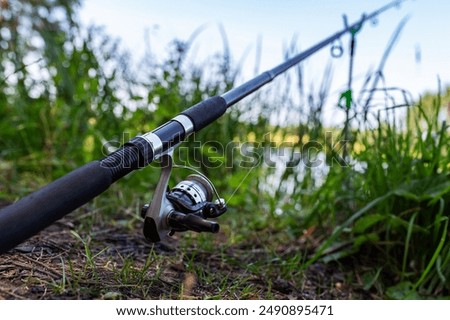 Fishing Blurred Background. Fishing Rod at the Lake. Summer, Spring, Calm, Mental, Silence, Meditation, Chill, Catch.