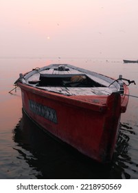 Fishing Boat In Ganges River Varanasi India At Sunrise