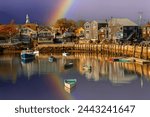 Fishing boat harbor at Rockport, MA.  Rockport is a town in Essex County, Massachusetts, United States, also First Congregational Church clock tower, Rockport