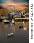 Fishing boat harbor at Rockport, MA.  Rockport is a town in Essex County, Massachusetts, United States, also First Congregational Church clock tower, Rockport