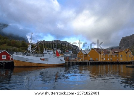 Similar – Image, Stock Photo Yellow fishing boat moored in ocean turquoise water