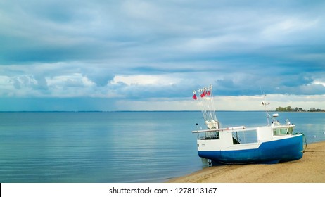 Fishing boat on Baltic Sea coast. Stormy weather. Mechelinki, Poland, Pucka Bay. - Shutterstock ID 1278113167