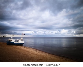 Fishing boat on Baltic Sea coast. Stormy weather. Mechelinki, Poland, Pucka Bay. - Shutterstock ID 1386906407