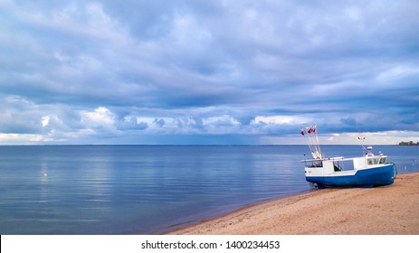 Fishing boat on Baltic Sea coast. Stormy weather. Mechelinki, Poland, Pucka Bay. - Shutterstock ID 1400234453