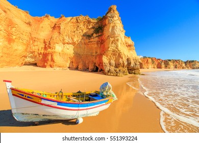Fishing boat on a Praia da Rocha in Portimao, Algarve region, Portugal