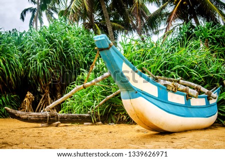 Fishing boat on the sand. Kalutara. Sri Lanka