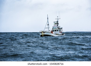 Fishing Boat In Open Cold Sever Ocean