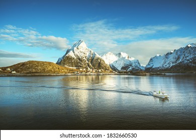 Fishing Boat And Reine Village, Lofoten Islands, Norway