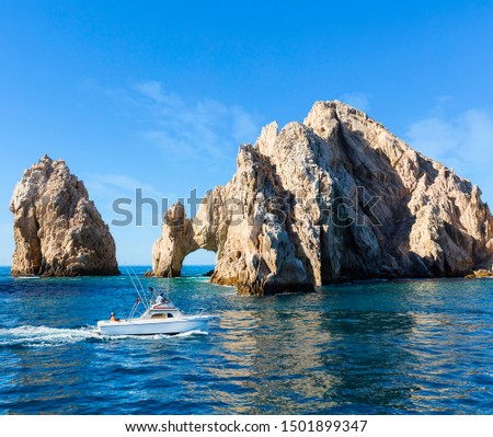 Fishing boat returns from a day out on the water in Los Cabos, Mexico
