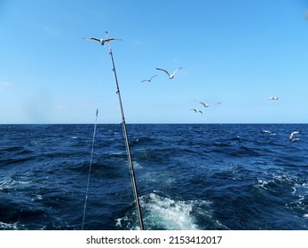 Fishing From A Boat In A Rough Sea.