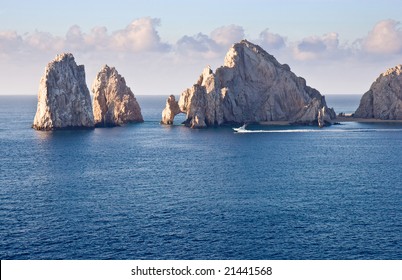 Fishing Boat Sailing By Los Arcos In Cabo San Lucas, Mexico