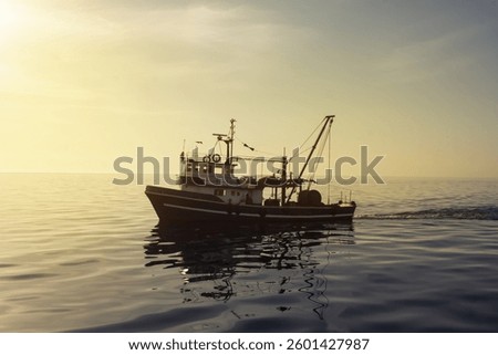 Fishing boat at sunrise in the open sea. Trawler. Fishing and Sightseeing Boat Trips.