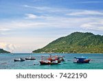 Fishing Boats in Emerald Sea