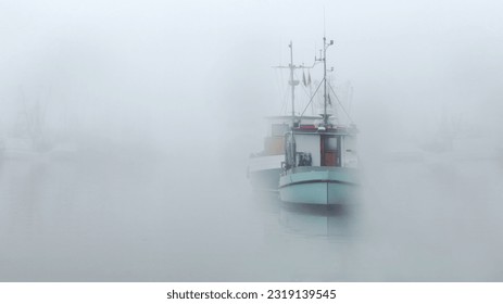 FISHING BOATS IN FOGGY NORTH SEA                    - Powered by Shutterstock