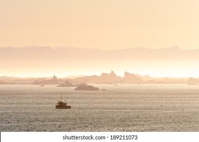 Fishing Boats Go Out Late At Night In Summer Time. The Sun Will Stay Up All Night Long