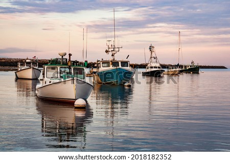 Fishing boats in a harbor of Camp Ellis, Maine, on a summer day. USA