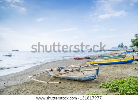 fishing boats on dili beach in east timor