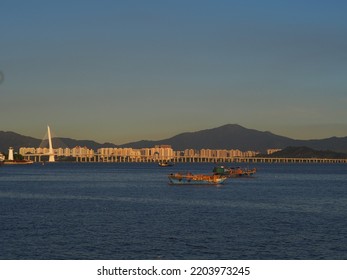 Fishing Boats On The Roadstead In The Sunset