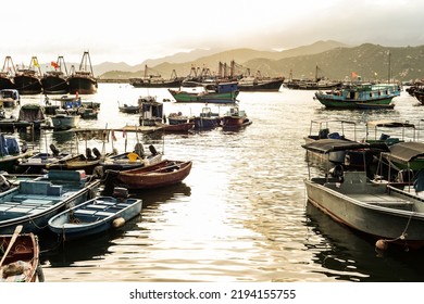 Fishing boats on the sea in Cheung Chau Island at sunrise, Hong Kong