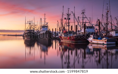 Fishing boats in Steveston Harbour at dusk, Richmond, British Columbia