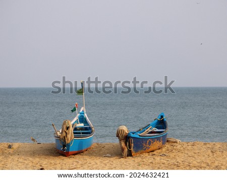 The fishing boats are taking a nap on the sea shore.
 A beautiful view captured from Ettikulam Beach, Kannur, Kerala on May 19, 2018.