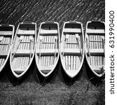 Fishing boats - vessels at a pier in Lake Shojiko, Japan. Black and white photo.