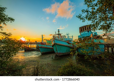 Fishing Boats Waiting For The Rising Tide To Go Fishing In The Gulf Of Thailand