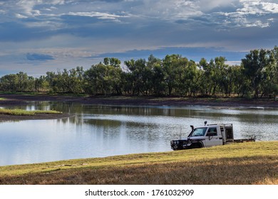 Fishing At The Chinchilla Weir With A Pickup Truck On The Grass